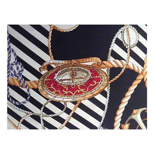 Custom pillow made with vintage silk scarf featuring logo in iconic nautical pop art pattern. New linen back with zipper...