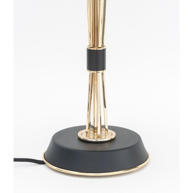 Pair of DelightFull Black and Gold-Tone Table Lamps, each with three bulb fittings and label to underside. 19.75" H x...
