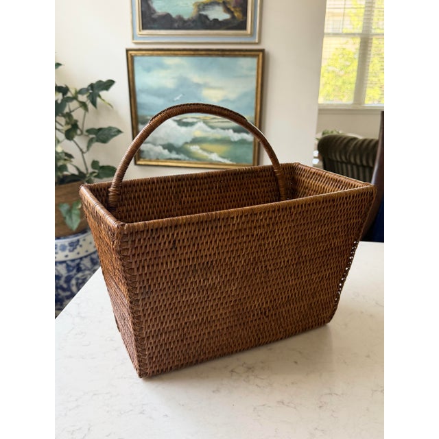 Handmade wood and woven rattan basket with handle for hanging or propping against the wall. Sturdy piece with so many...
