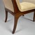 A fine Neoclassical bench in a lyre form. Beautifully finished, exposed walnut frame with tight seat and sides....