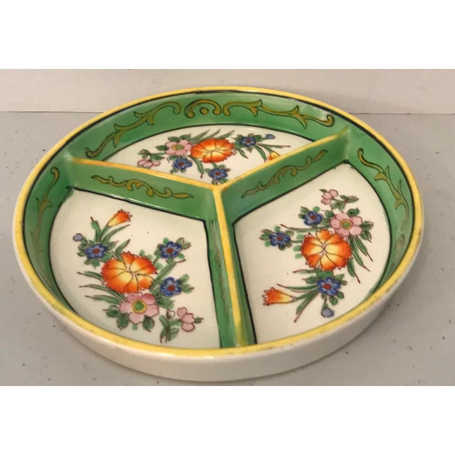 Very pretty divided tray with hand painted floral design. Marked Japan on bottom.
