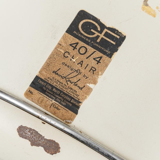 Set of 6 40/4 chairs by David Rowland for GF Furniture. Metal frame with white seats. The item shows signs of rust, as...