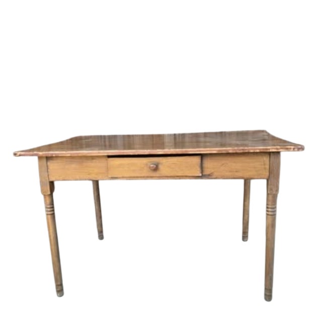 Sweet early American one drawer writing desk. slim turned legs softwood, pine. Would suggest waxing or refinishing.