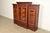 A gorgeous antique Victorian or Renaissance Revival triple bookcase cabinet or display cabinet In the manner of R.J....