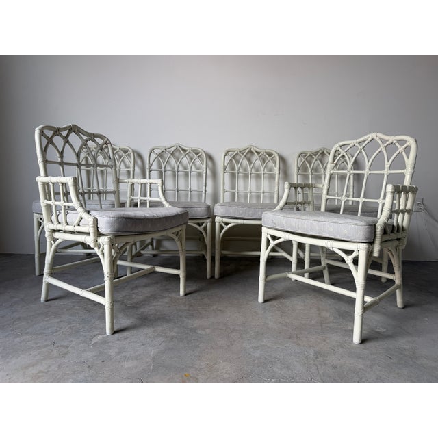 A beautiful set of six authentic McGuire dining chairs featuring the iconic bamboo frames with hand leather-wrapped...