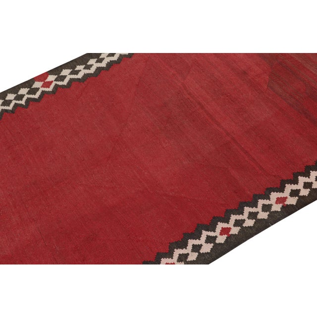 This vintage 5x13 Persian kilim is believed to be a Shahsavan tribal rug—handwoven in wool circa 1950-1960. On the Design:...