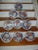 A fine set of nine Mason's ironstone imari plates from the early 19th c. Each plate with lobed edges; orange and blue...