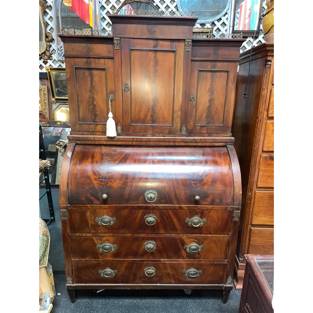 Large Gustav Knauer rolltop desk Berlin circa 1914 executed in hardwoods and having a metal decorative railing around the...