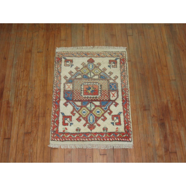 A one of a kind ivory field Turkish Anatolian rug.