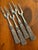 Add to your entertaining with this set of four vintage silver-plated charcuterie and cocktail forks by Silea. Featuring...