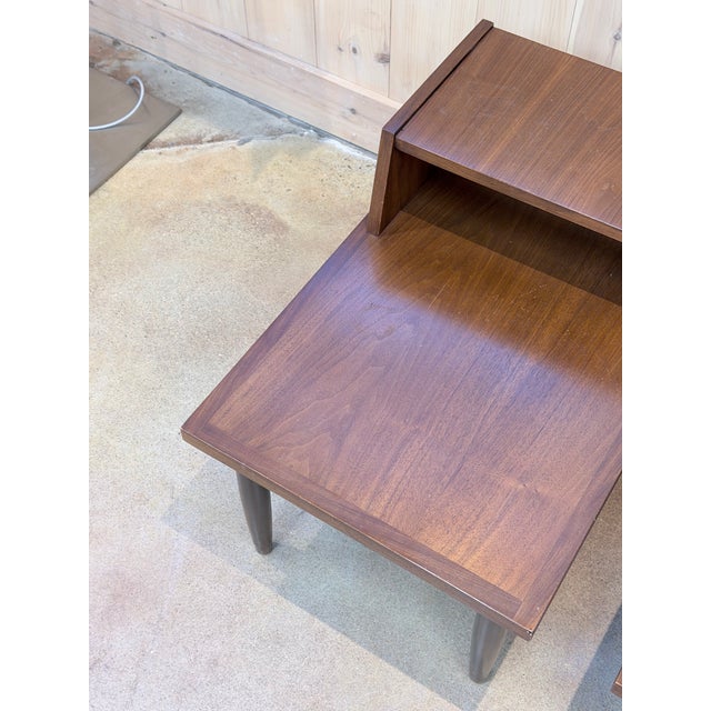 Mid 20th Century Pair of Vintage Mid-Century Modern Walnut Step Side Tables With Magazine Shelves For Sale - Image 5 of 7