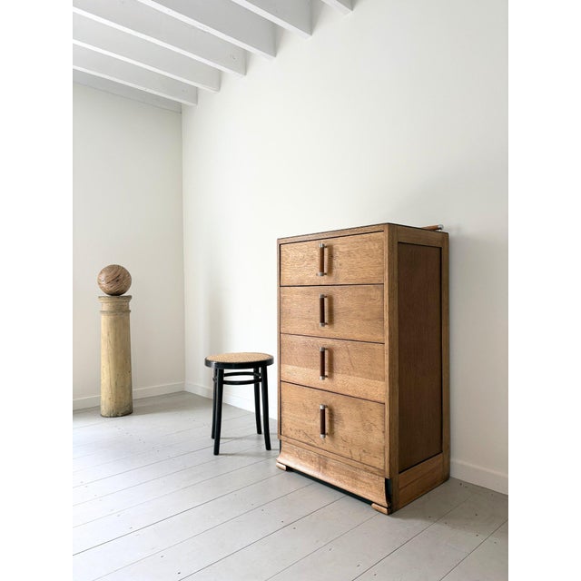 A rare and refined chest of drawers dating from the early 20th century. This art deco storage unit is expertly constructed...