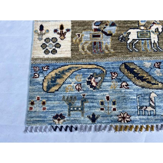 A pictorial runner in the Qashqai Kashkuli gabbeh tradition, hand-knotted in northern Afghanistan from hand-spun Ghazni...