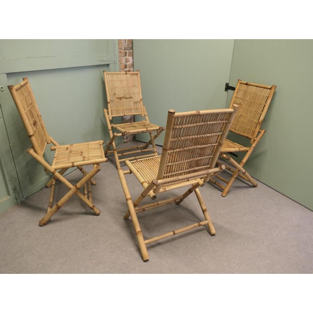A Set of 4 of Bamboo Planation Chairs These super folding Chairs are made with giant bamboo, they are in very good...