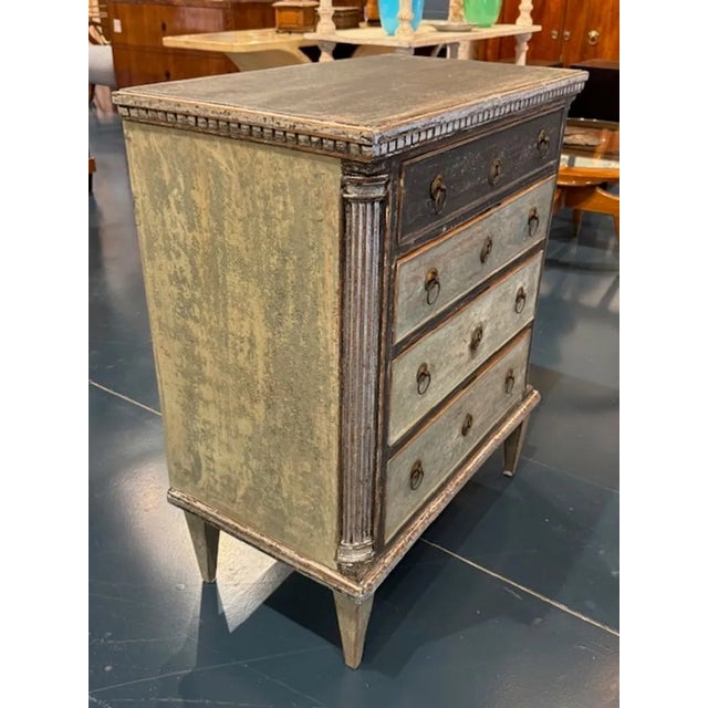 19th century Swedish Gustavian Empire style painted chest. You're exploring a piece that blends Scandinavian restraint...