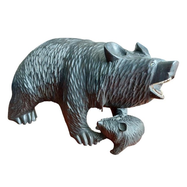 A set of carved "French" black forest bears. Beautiful wood carvings from the 1940s-1950s. The manual labor was done in...
