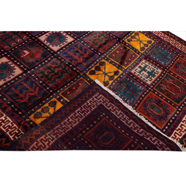 Beautiful Vintage Persian hand-knotted Wool rug with the red field. This Persian rug has a multicolor accents in all over...