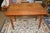 This is an antique English work table. Could be a small dining or side table. A rustic pine wood with turned legs. Single...