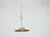 A French Midcentury gilt metal light fixture in the form of a radiant sunburst. The circular frame features finely cast...