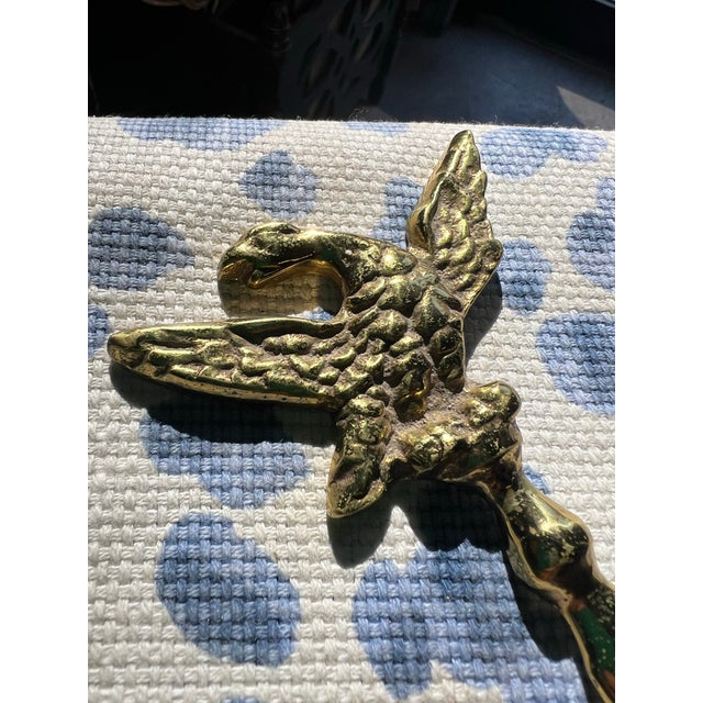 Up for consideration is a beautiful vintage brass envelope opener with eagle accents. This would look lovely in your home...