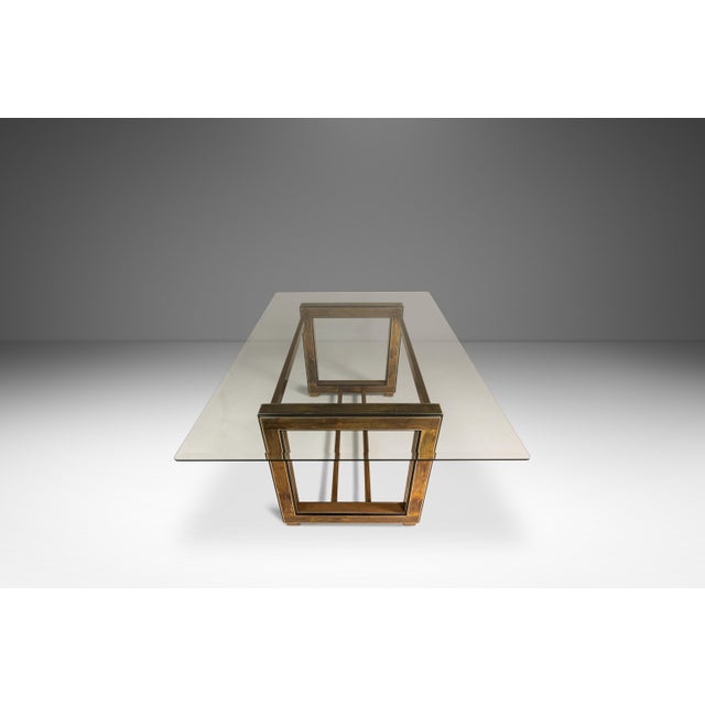 This striking Mid-Century dining table or desk, designed by Bernhard Rohne for Mastercraft, exemplifies the bold...