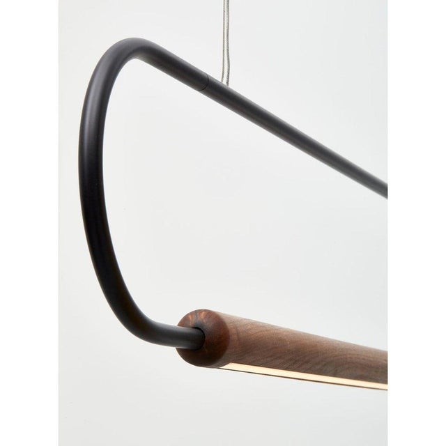 Walnut large horizontal link pendant by hollis & morris dimensions: 6ft x 75" x diameter 9" materials: solid wood, bent...