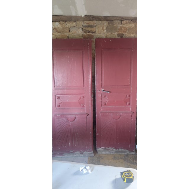 Beautiful pair of antique handmade French manoir doors, believed to date from the late 19th to early 20th century. Crafted...