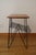 "Stringbord" teak side table, Sweden, 1950s/1960s. Matte black metal frame and teak veneer top. In very good condition...