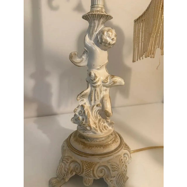 Late 20th Century Vintage Cherub Boudoir Lamp Pair — Rococo Revival Putti Bases W/ Fringe Shades For Sale - Image 5 of 10
