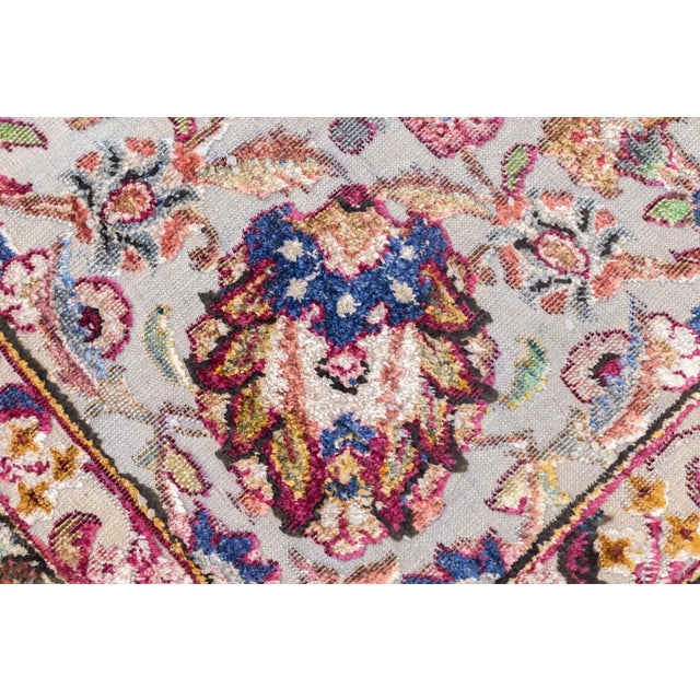 Central Persian city known for finely woven. room size and scatter rugs, with dominant reds and navy, and medallion...
