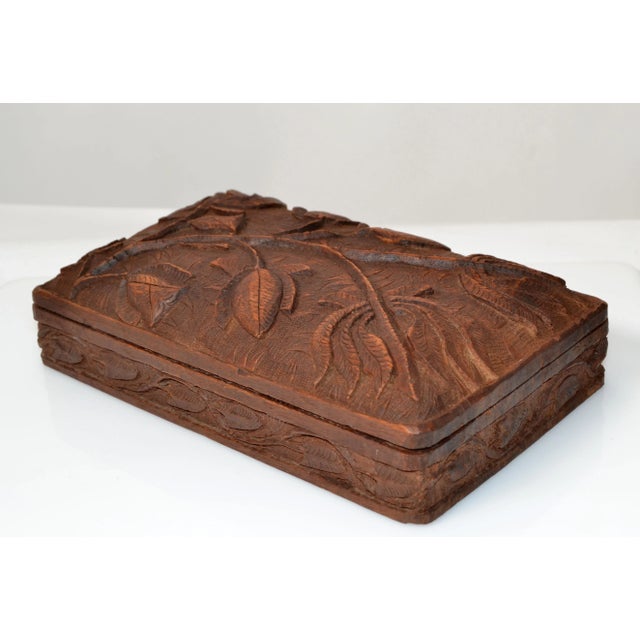 Vintage handmade beautifully carved wooden box, jewelry box or keepsake box. The Inside has 2 compartments which measure...
