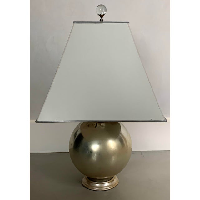 Gorgeous vintage mercury glass table lamp featuring a silvered glass globe base with silver leaf detailing and a beautiful...