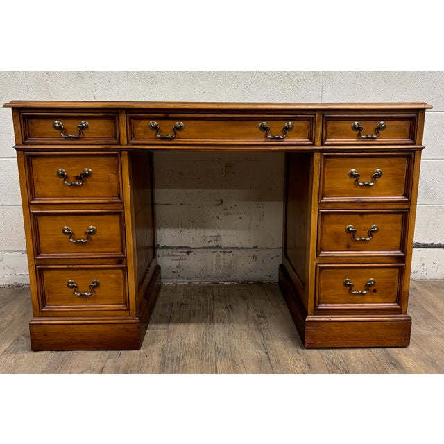 This is a beautiful vintage green leather top executive desk by Sligh Lowry Furniture, known for quality. This gorgeous...