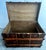 A beautiful early 20th-century flat-top travel trunk distributed by the C.W. Weeks Co. of Springfield, Massachusetts. This...
