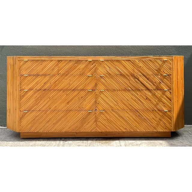 This exceptional vintage six-drawer dresser is expertly crafted from natural rattan, showcasing a striking chevron pattern...