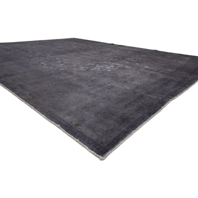 Distressed Vintage Turkish Dark Gray Area Rug with Industrial Steampunk Style. With remnants of traditional forms...
