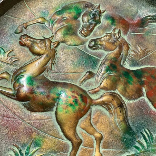 Wonderful patinas accentuate this beautiful piece for hanging or to display flat.