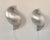 Pair of wall sconces with a metal frame, produced in France in the 1970s. An important piece of 1970s French design, this...