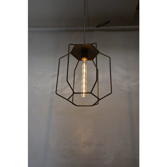 This light pendant is designed and fabricated by Oblik studio inc in Brooklyn NY. A lantern to catch St Elmos fire. St...