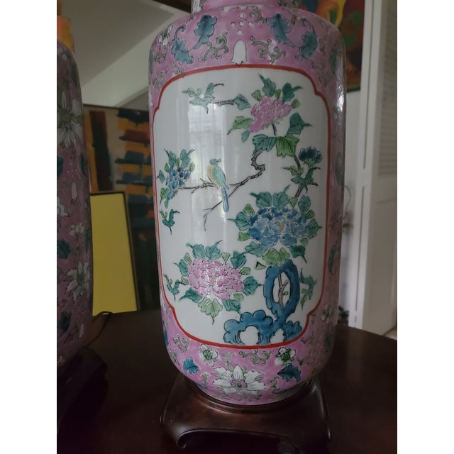 A rare pair of Chinese porcelain lamps in a lavender color with raised enamel decoration. All hand made with high quality...