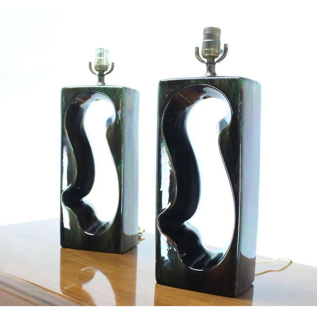 Very hot looking vintage circa 1970s glazed Art pottery table lamps.