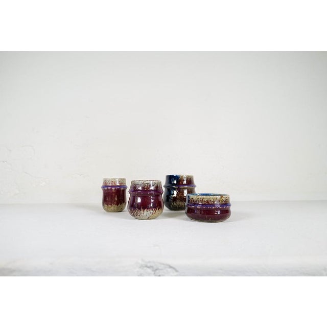 This set containing 4 pieces ceramic was designed by sylvia leuchovius and produced by rörstrand. These four pieces are...