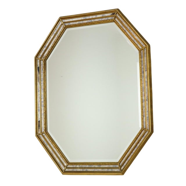 Beautiful vintage Venetian-style mirror by Deknudt, featuring inset glass accents around the perimeter and a central...
