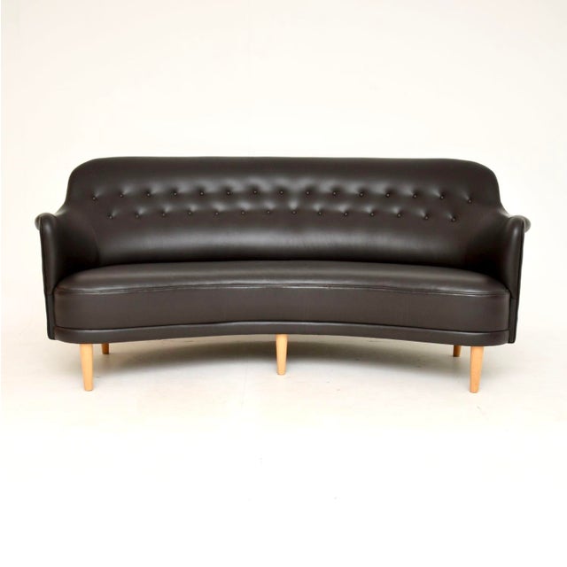 This is an absolutely stunning and iconic design. It’s the Swedish Leather Samsas Round Sofa designed by Carl Malmsten in...