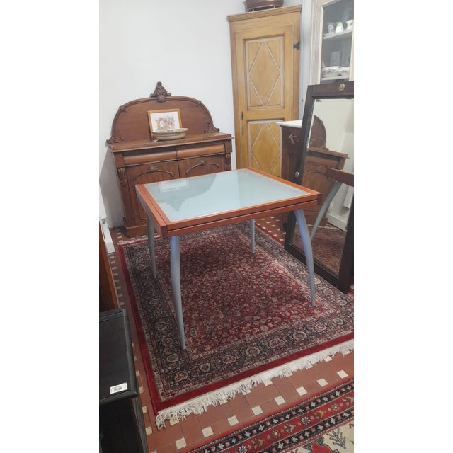 Modern Italian Table in Wood and Glass, 2000, in Very Good conditions. Designed from 2000 This piece has an attribution...