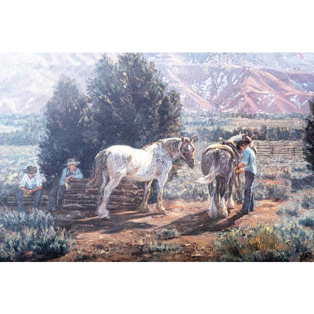 A beautifully composed vintage Western landscape by American artist Valoy Eaton, depicting ranch hands and horses gathered...