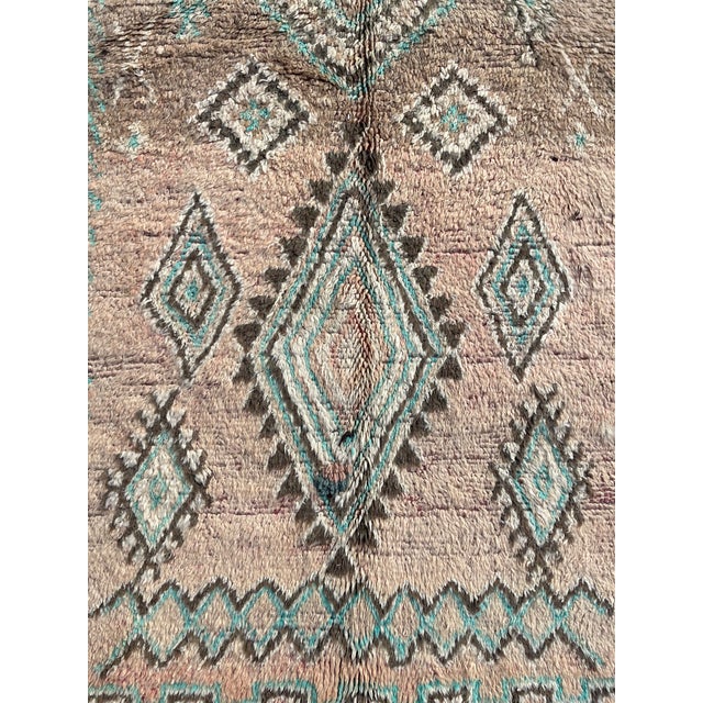 Boujaad rugs are hand woven pile rugs from a small region in Haouz between the Middle Atlas and the Atlantic ocean. Made...