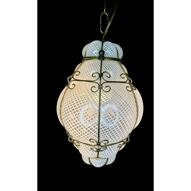 Stunning Pair of Caged Venetian Lantern in Murano Reticello Glass. Manufactured in the glass blowing capital of the world...