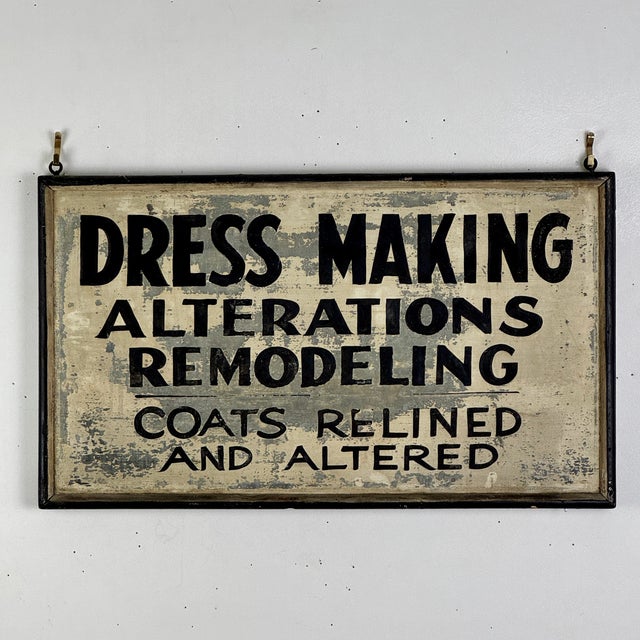 A original vintage early 20th Century seamstress trade sign; advertising "Dress Making Alterations remodeling" + "coats...