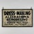 A original vintage early 20th Century seamstress trade sign; advertising "Dress Making Alterations remodeling" + "coats...